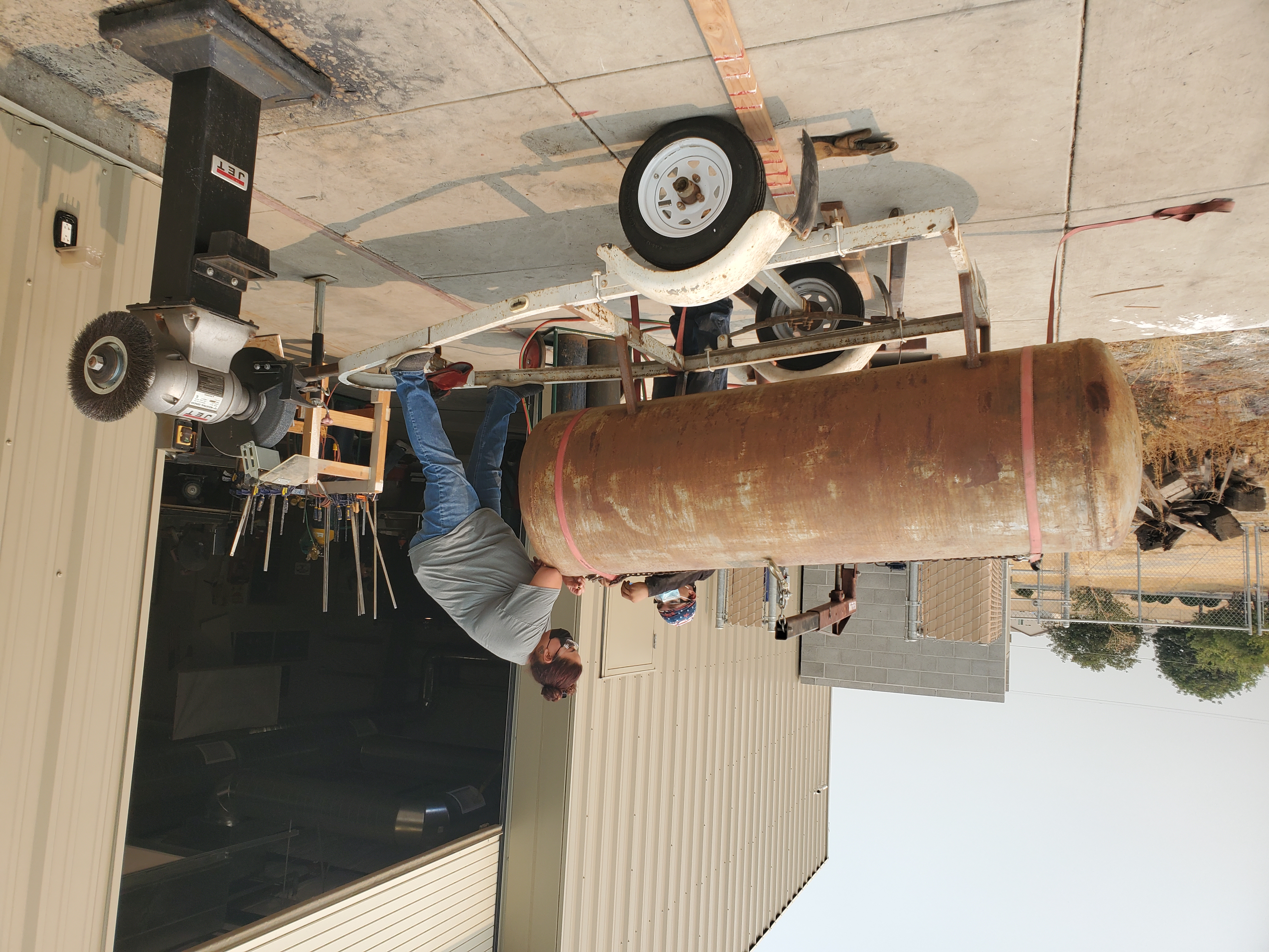 Students learning to weld