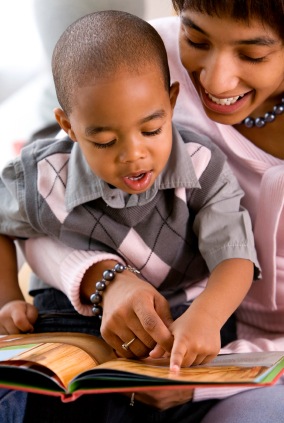 Mother reading to her son